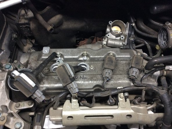 Remettre les bobines en place et remettre les boulons.