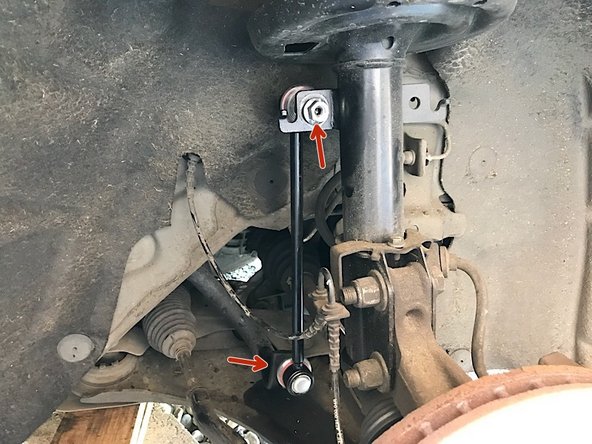 Placer la nouvelle biellette et mettre les écrous.