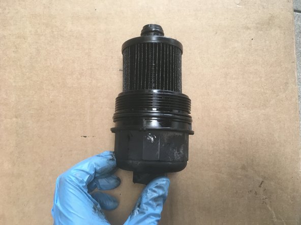 Tirer vers le haut pour retirer la cartouche de la cloche