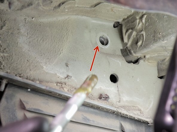 Replacer la vis du haut de l'amortisseur puis rapprocher la sans bloquer