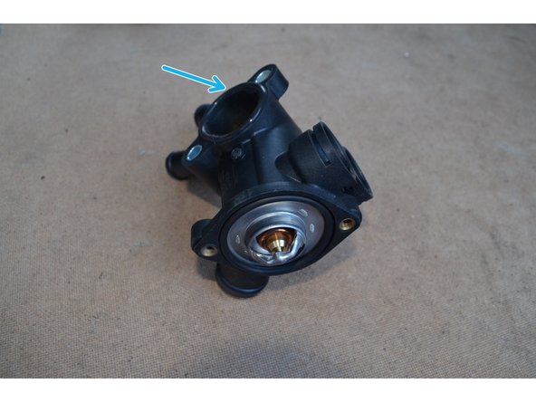 Placez le joint du thermostat.