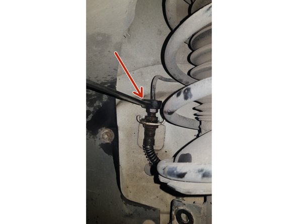 Placez un récipient pour récupérer tout le liquide qui va s'écouler.