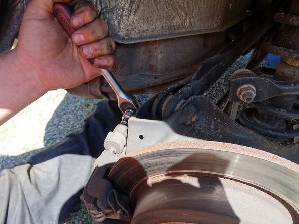 
replace the caliper with its plate fixed on it tighten the two caliper screws to a torque of 25Nm, 2.5m.kg or daNm
