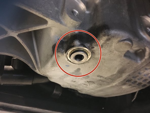 Mettre un bac de vidange sous le véhicule