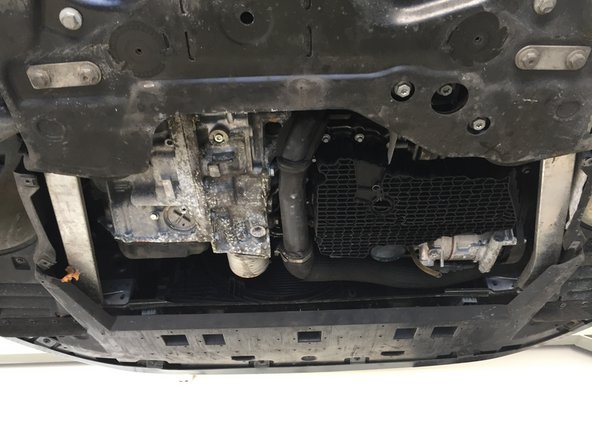 Remettre la plaque sous moteur