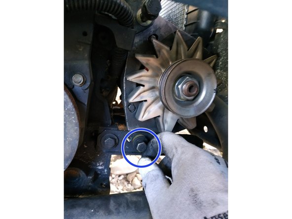 
put the tensioner screw in place and advance it using the 13mm key (do not screw it in all the way)
