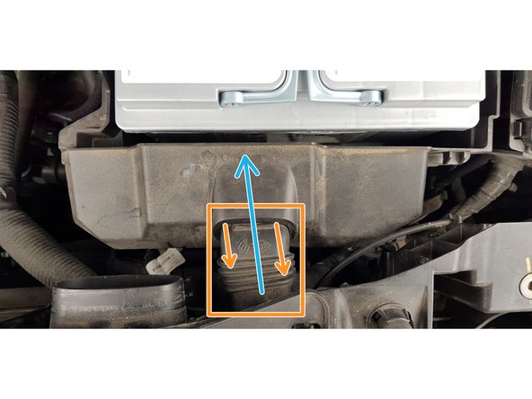 Pousser le manchon vers l'avant du véhicule pour le retirer.