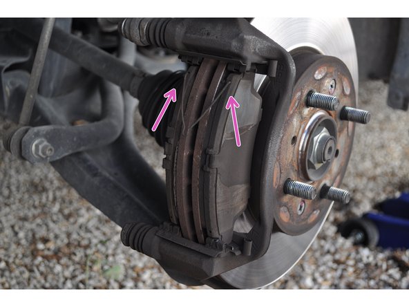 
A retaining spring between the 2 plates. Pinch the ends and remove the .
