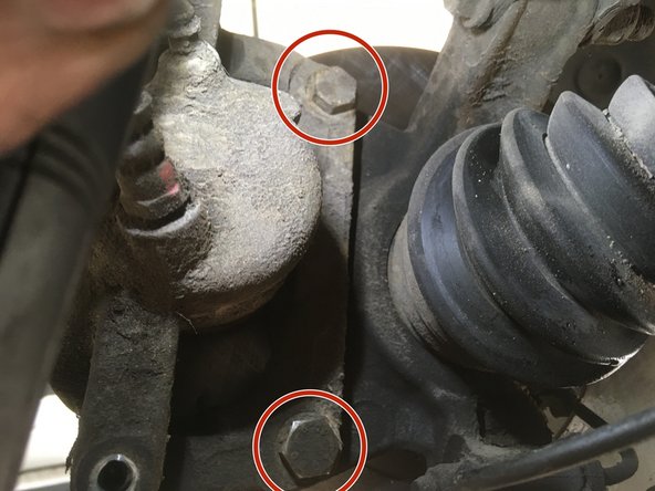 Viser les deux vis de 18 à l'aide du cliquet