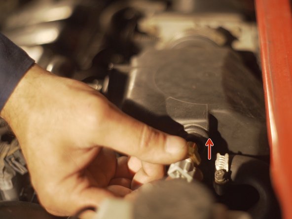 
Screw the new probe onto the air box cover
