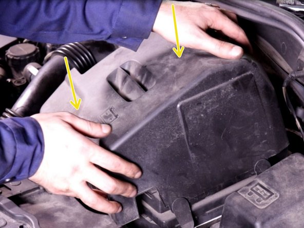 Reposer les 2 caches de la batterie