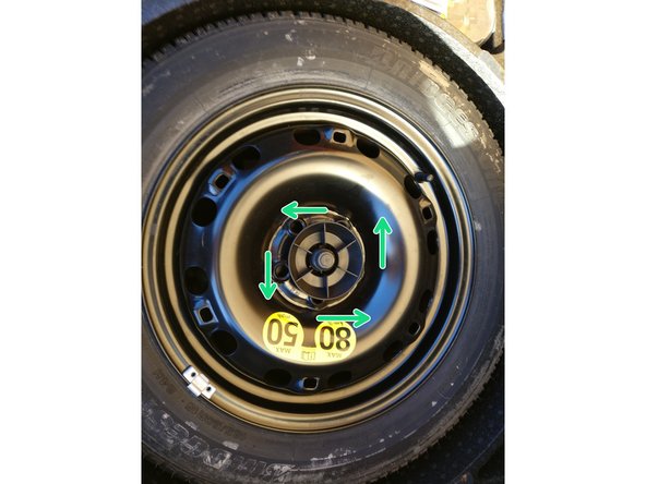 Dévisser la pièce plastique qui maintiens la roue en place