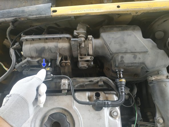 
unclip the hose plug on the air box
