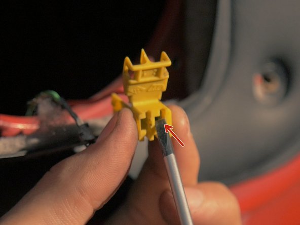 
Still using the small flat screwdriver, push the terminals from inside the connector
