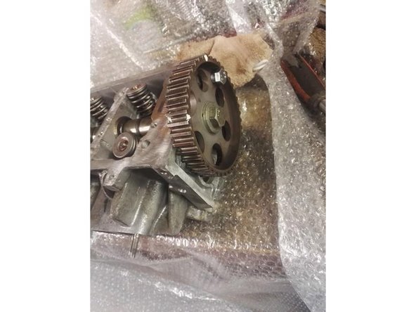 Remontez la poulie d'AAC et remettre la pige en place