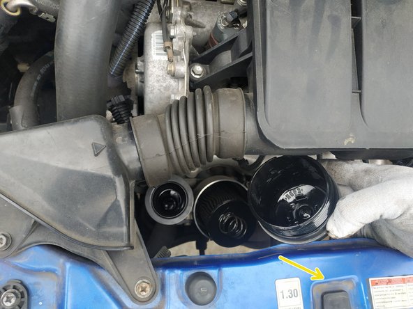 finir de dévisser à la main et retirer la cloche