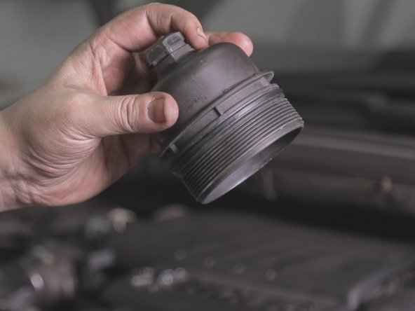 Revisser à la main la cloche sur son support.