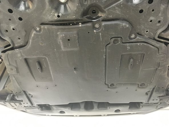 Remettre la plaque sous moteur