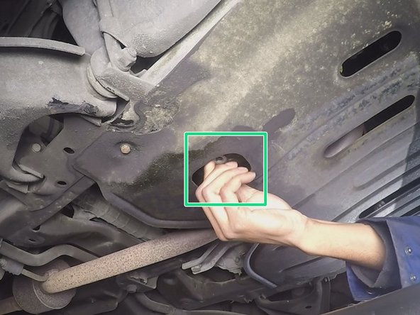 Replacer puis revisser à la main le bouchon de carter