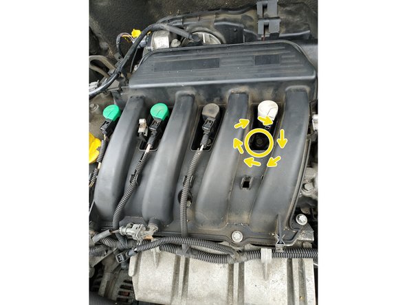 visser la vis de fixation de la bobine avec la clé de 10mm