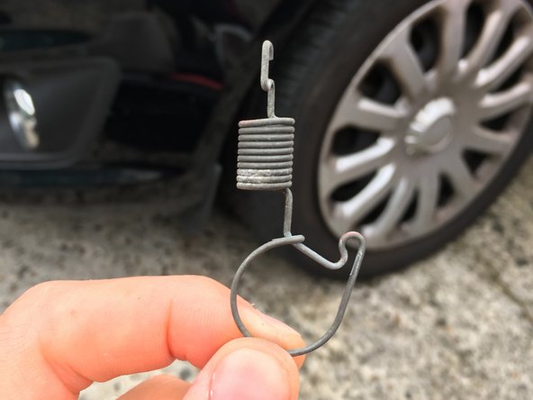 
Retrieve the fixing spring from the old light
