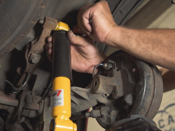 
Place the nut on the screw
