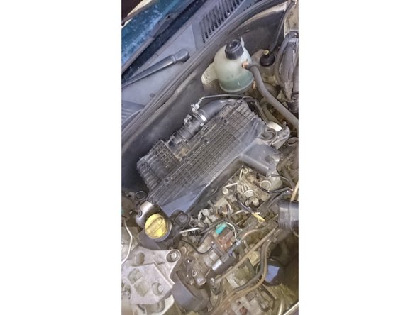 Remettre la boite a air et rebrancher la prise .