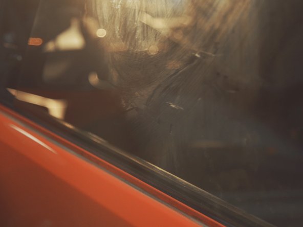 
Slide the glass between the door and the interior seal
