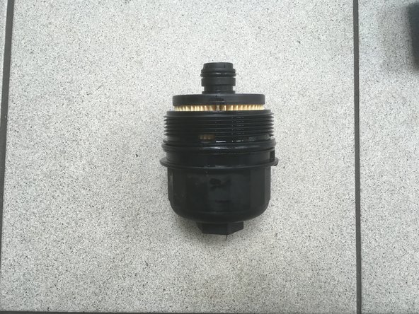 Clipser la nouvelle cartouche dans la cloche