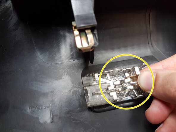 Replacer l'ampoule dans le support