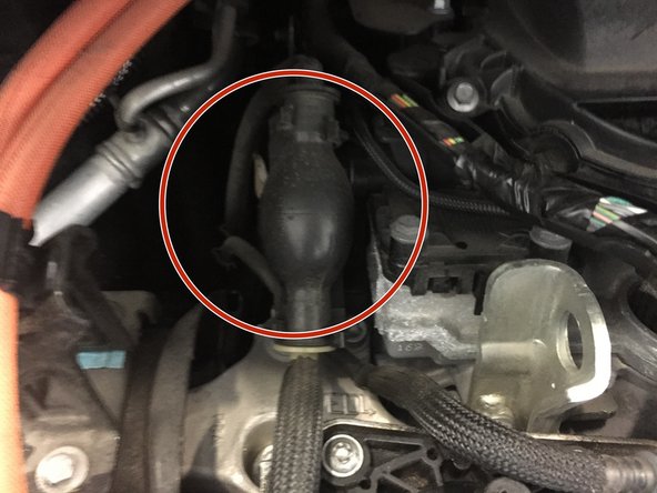 
Replace the engine cover by clipping it in place
