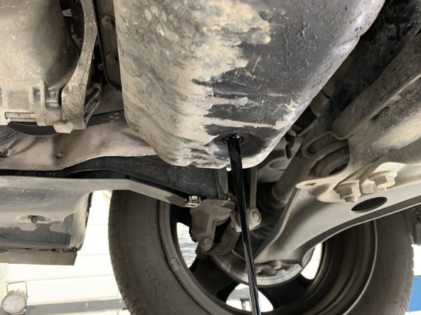 Laisser couler l'huile jusqu'au goutte à goutte