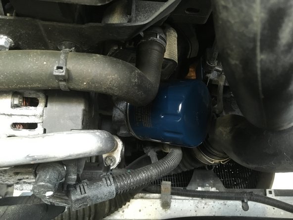 Remonter le filtre à huile en le serrant à la main