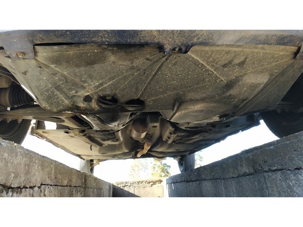 quand on sait que tout va bien, couper le moteur et remonter le cache sous la voiture (clés de 10mm et 13mm)