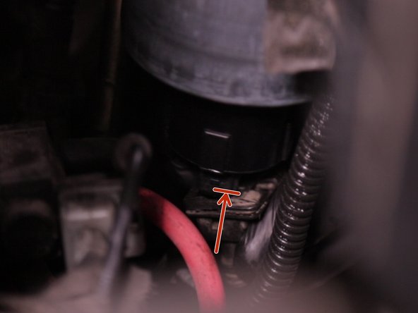 Replacer le capteur sous le nouveau filtre