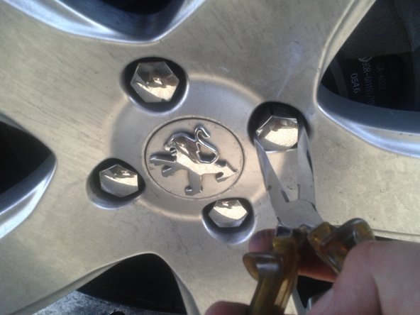 repose des bras d'essuie-glace  (sens inverse de la dépose)