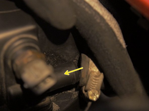 
Replace the air connector hose at the rear of the air box
