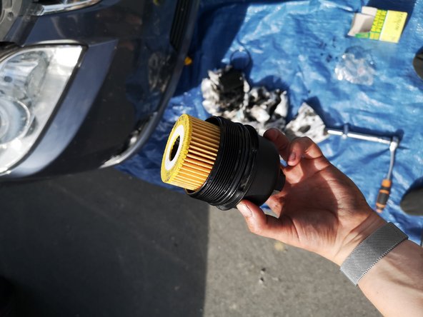 Puis remettez la cloche dans son emplacement d'origine en respectant le couple de serrage indiqué sur celle-ci.