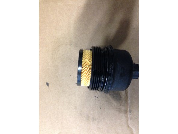 Monter la nouvelle cartouche du filtre en la clipsant