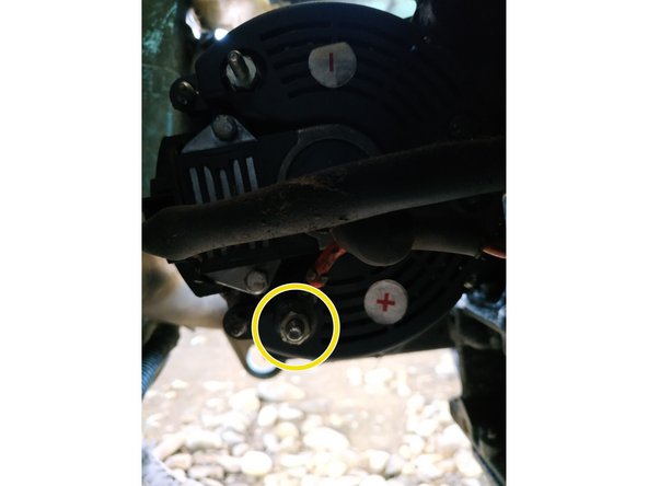 
reconnect the red wire and screw the nut, 10mm wrench
