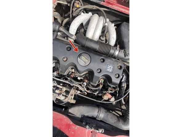 Dévisser le bouchon de remplissage et remplir avec 4.5 Litres d'huile