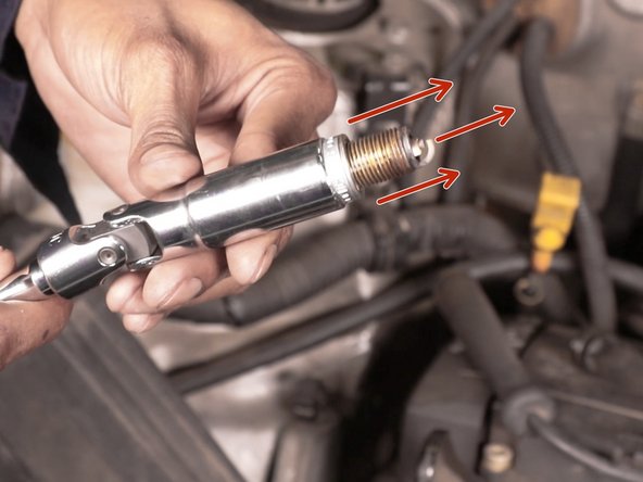 Extraire la bougie de la douille