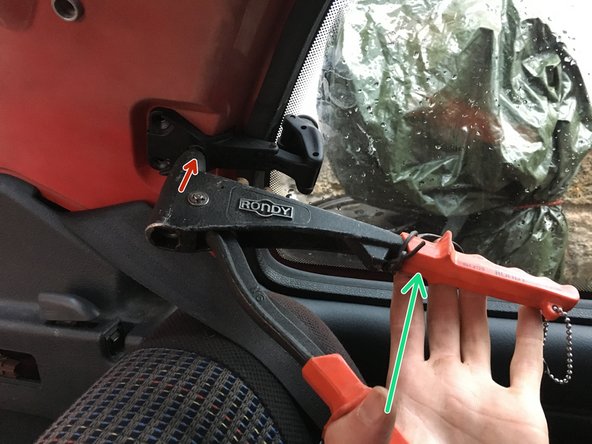 
Place the head of the rivet in one of the holes in the opening system paste
