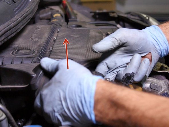 De clipser le manchon d'aspiration vers le bas