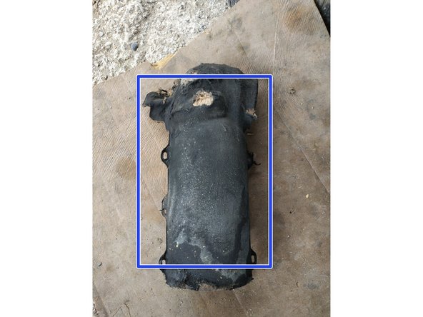 retirer le pare-chaleur (je l'ai sorti par le bas)