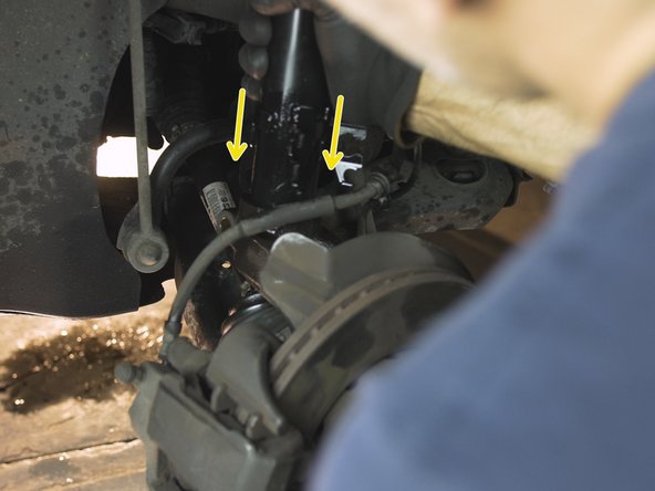 Placer l'amortisseur dans son emplacement