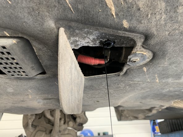 Laisser couler l'huile jusqu'au goutte à goutte