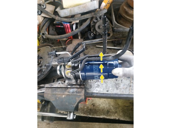 visser à la main jusqu'au contact et faire 3/4 de tour