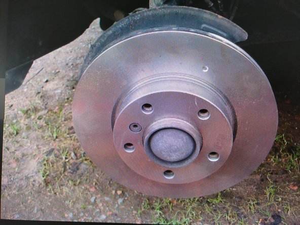 Mettre le nouveau disque en place et faire le remontage dans le sens inverse