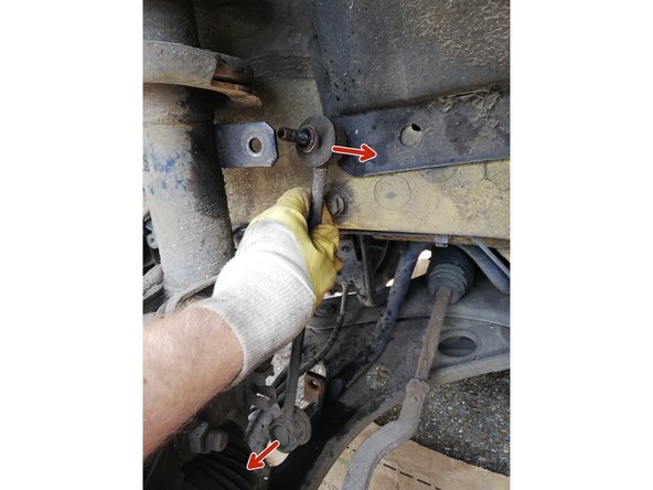 
After the nuts are removed, remove the old tie rod by freeing the ends.
